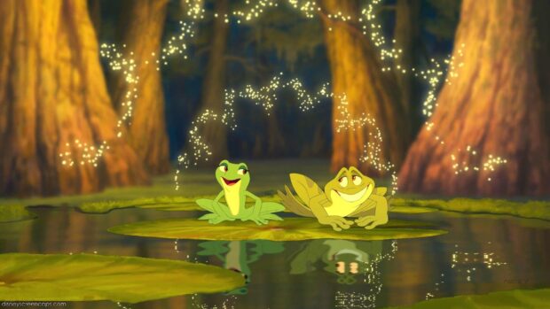 Two animated frogs sitting on lily pads in the swamp from The Princess And The Frog