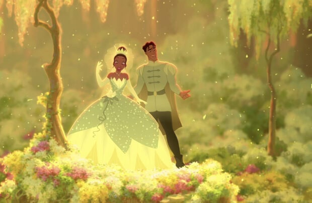The princess and prince standing in a glowing garden surrounded by flowers and trees