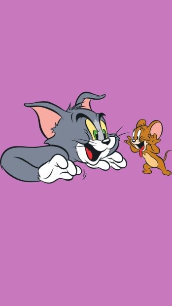 Tom and Jerry characters playing on a purple background with Tom chasing Jerry in a playful scene