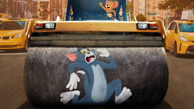 Tom is driving a roller with Jerry on the street scared and Tom and Jerry characters are featured on the roller surface