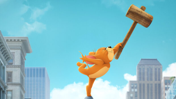 Jerry balancing on one foot while holding a large wooden mallet in the cityscape