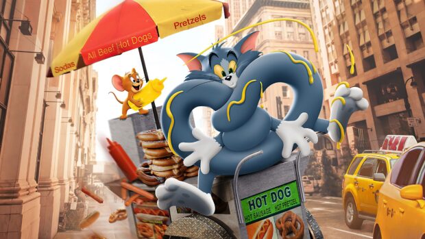 Tom and Jerry cartoon characters in a city street scene with Tom tangled in a pretzel and Jerry holding mustard