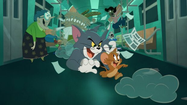 Tom and Jerry chasing each other inside a train with passengers reacting in shock