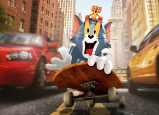 Tom and Jerry skateboarding in the busy city street with Tom holding a skateboard tightly