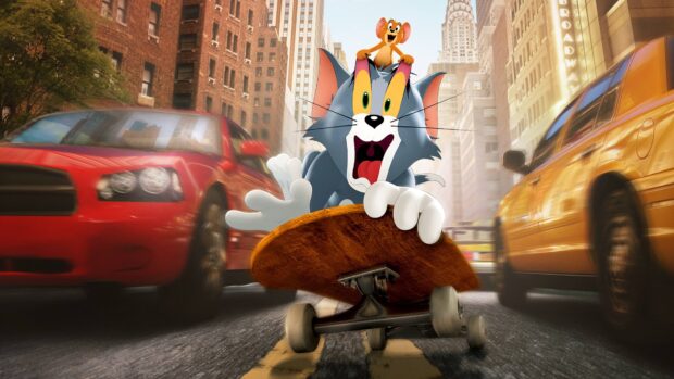 Tom and Jerry skateboarding in the busy city street with Tom holding a skateboard tightly