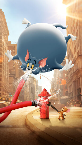 Tom and Jerry characters interacting with a fire hydrant on a city street in Tom And Jerry