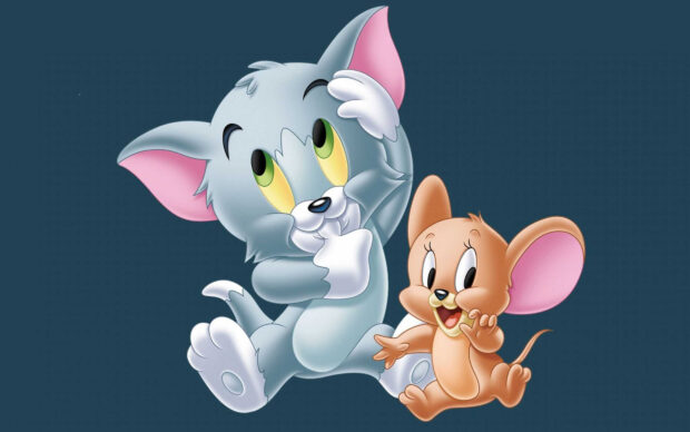 Tom and Jerry characters smiling together in a playful pose on a blue background