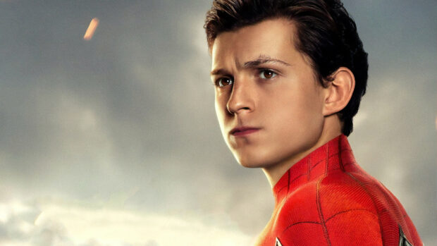Tom Holland wearing red Spider Man suit looking serious in high resolution background