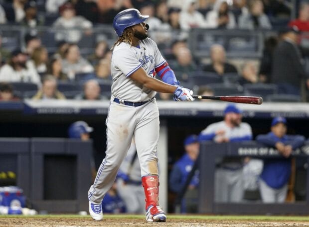 Toronto Blue Jays player swinging the bat during a baseball game at the stadium