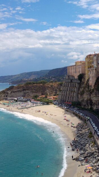 Scenic Tropea coastline with cliffs and turquoise sea on a sunny day