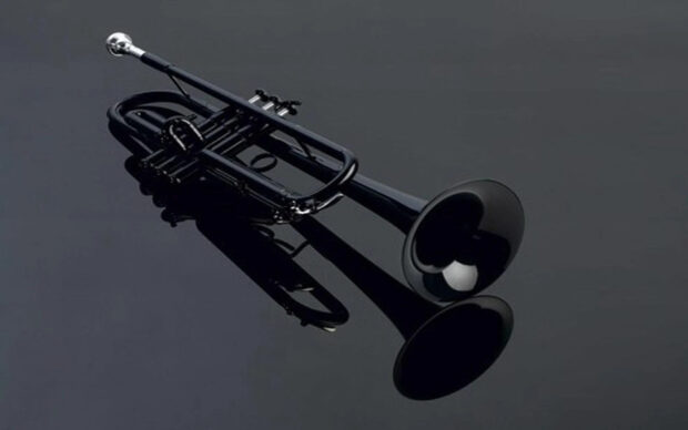 Trumpet Wallpapers HD Desktop Black trumpet lying on reflective surface showing the instrument's details and shadow