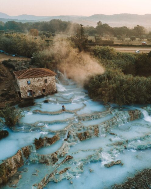 Tuscany natural terraces with turquoise water in Tuscany surrounded by greenery and hills