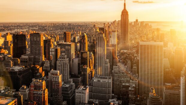Stunning Usa skyline with sunlit skyscrapers at golden hour in New York City