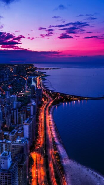 City skyline with vibrant sunset lights along the usa coastline