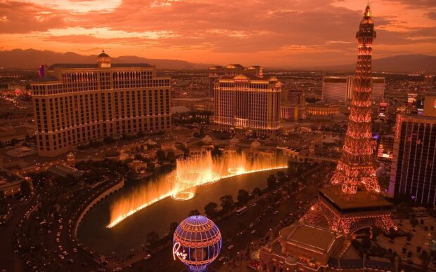 The Las Vegas Strip lit up with iconic landmarks during sunset in USA