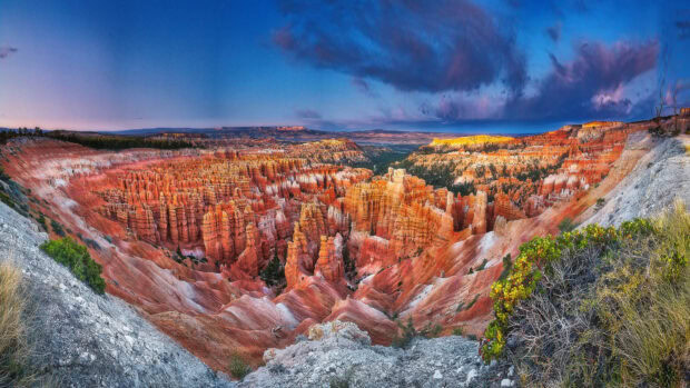 Stunning Utah rock formations with vibrant colors under a dramatic sky in a natural landscape
