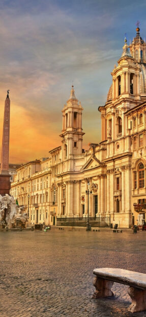 The historic architecture of Vatican City with a beautiful sunset sky