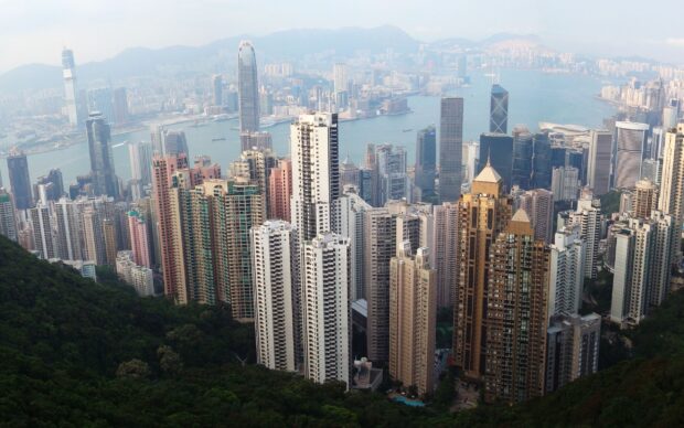 High rise buildings and lush greenery at Victoria Peak skyline view