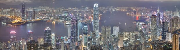Stunning Victoria Peak cityscape showcasing illuminated skyscrapers and vibrant night lights