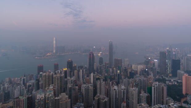 Victoria Peak cityscape at dusk with skyscrapers and harbor view in high resolution
