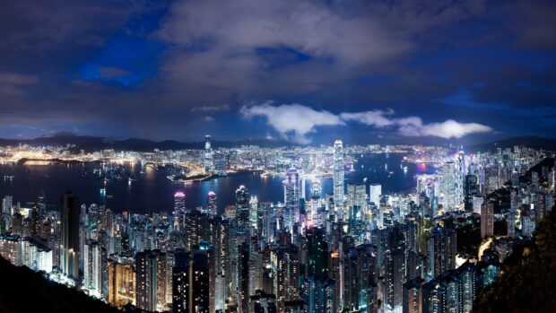 Night cityscape view of Victoria Peak with vibrant lights and Victoria Peak skyline