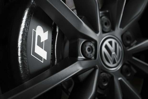 Close up of Volkswagen car wheel with R brake caliper detail