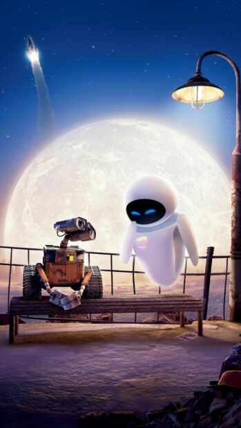 Wall e and Eve robot characters sitting on a bench with a large moon in the background