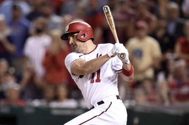 A Washington Nationals player wearing number 11 prepares to swing the bat during a baseball game