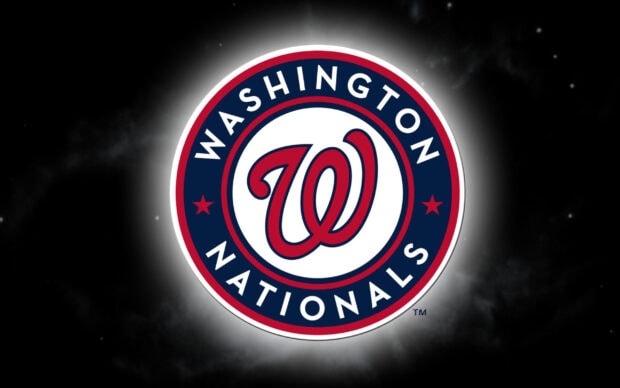 Washington Nationals logo in red white and blue with a glowing effect on a dark background
