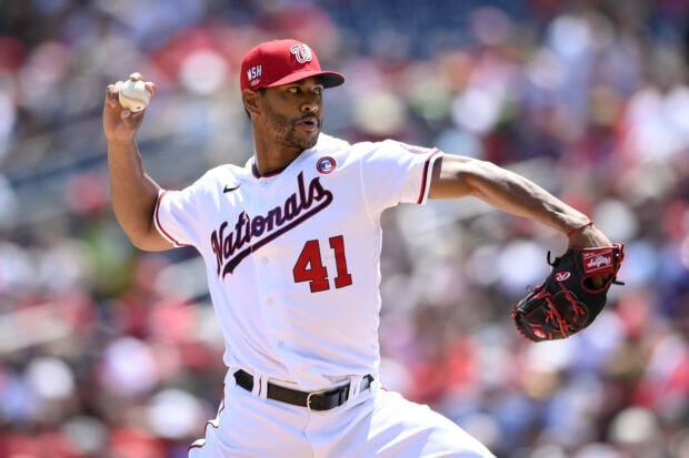 A Washington Nationals player pitching during a baseball game at the stadium (1)
