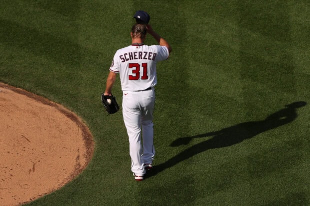 Washington Nationals player Scherzer walking on the field during a game