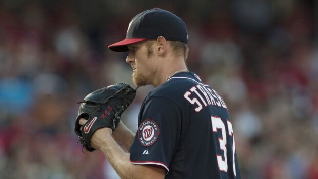 Washington Nationals player preparing to pitch on the field during a game