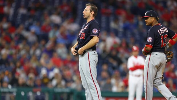A Washington Nationals player wearing jersey number 31 standing on the field during a baseball game