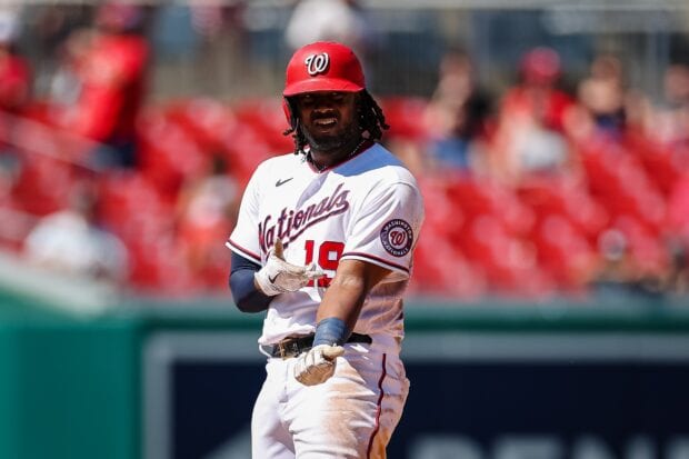 Washington Nationals player in action wearing number 19 baseball uniform