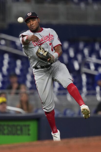 Washington Nationals player throwing a baseball during a game in action