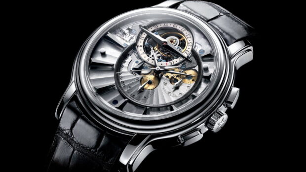 Luxury watch mechanism showing detailed gears on a black leather strap