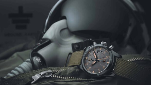 Military style chronograph watch with fabric strap on tactical gear