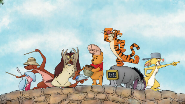 Winnie The Pooh character holding a honey pot with friends standing on a stone wall under a blue sky