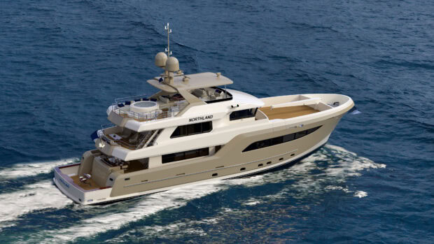 A luxury yacht named Northland cruising through the deep blue ocean water