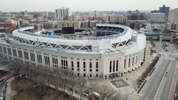 Aerial view of Yankee Stadium surrounded by city buildings in New York