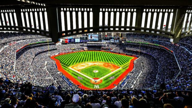 A panoramic view of Yankee Stadium filled with fans during a baseball game