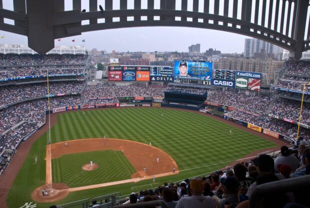 A panoramic view of Yankee Stadium filled with fans during a baseball game