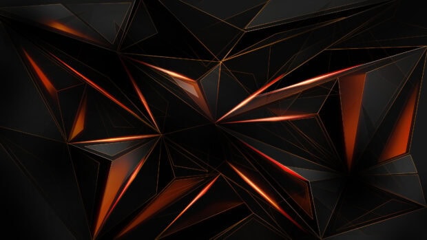 Dark geometric abstract shape with glowing orange edges forming a complex pattern
