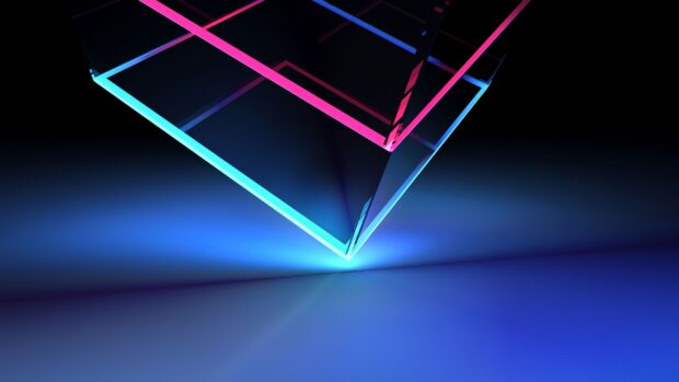 Transparent abstract shape with glowing blue and pink edges on dark surface