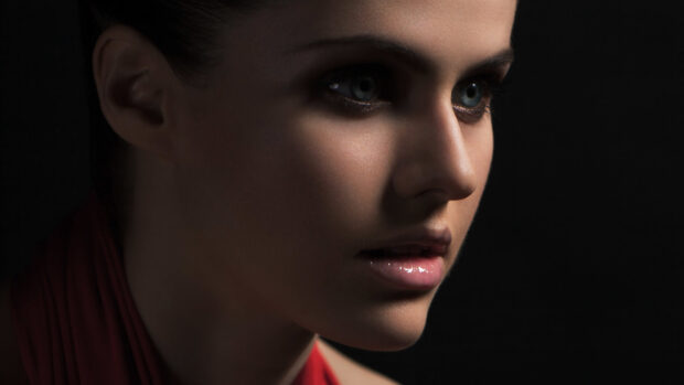 Close up portrait of Alexandra Daddario with blue eyes and glossy lips