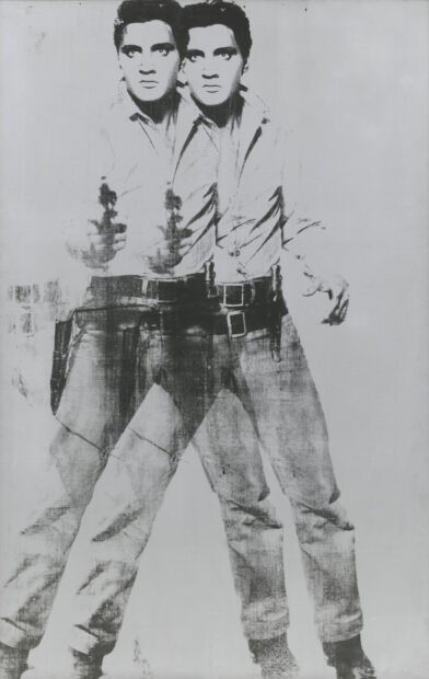 Two overlapping black and white figures holding guns in an Andy Warhol artwork