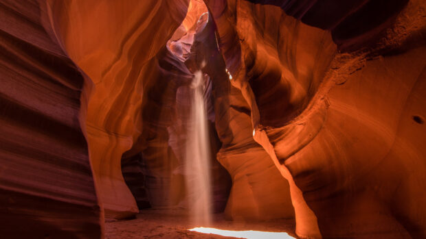 Light beam falling inside Antelope Canyon rock formations
