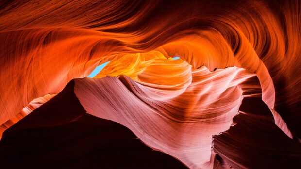 A stunning view of Antelope Canyon rock formations showcasing smooth curves and vibrant colors