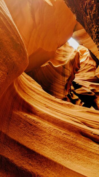 Stunning natural formations of Antelope Canyon with vibrant light rays and smooth rock surfaces
