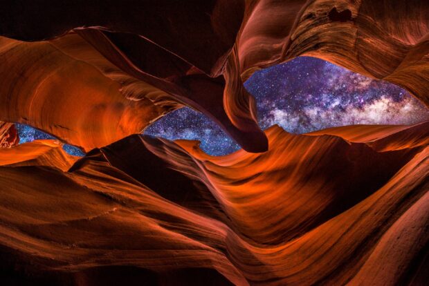 Stunning rock formations of Antelope Canyon under a starry night sky